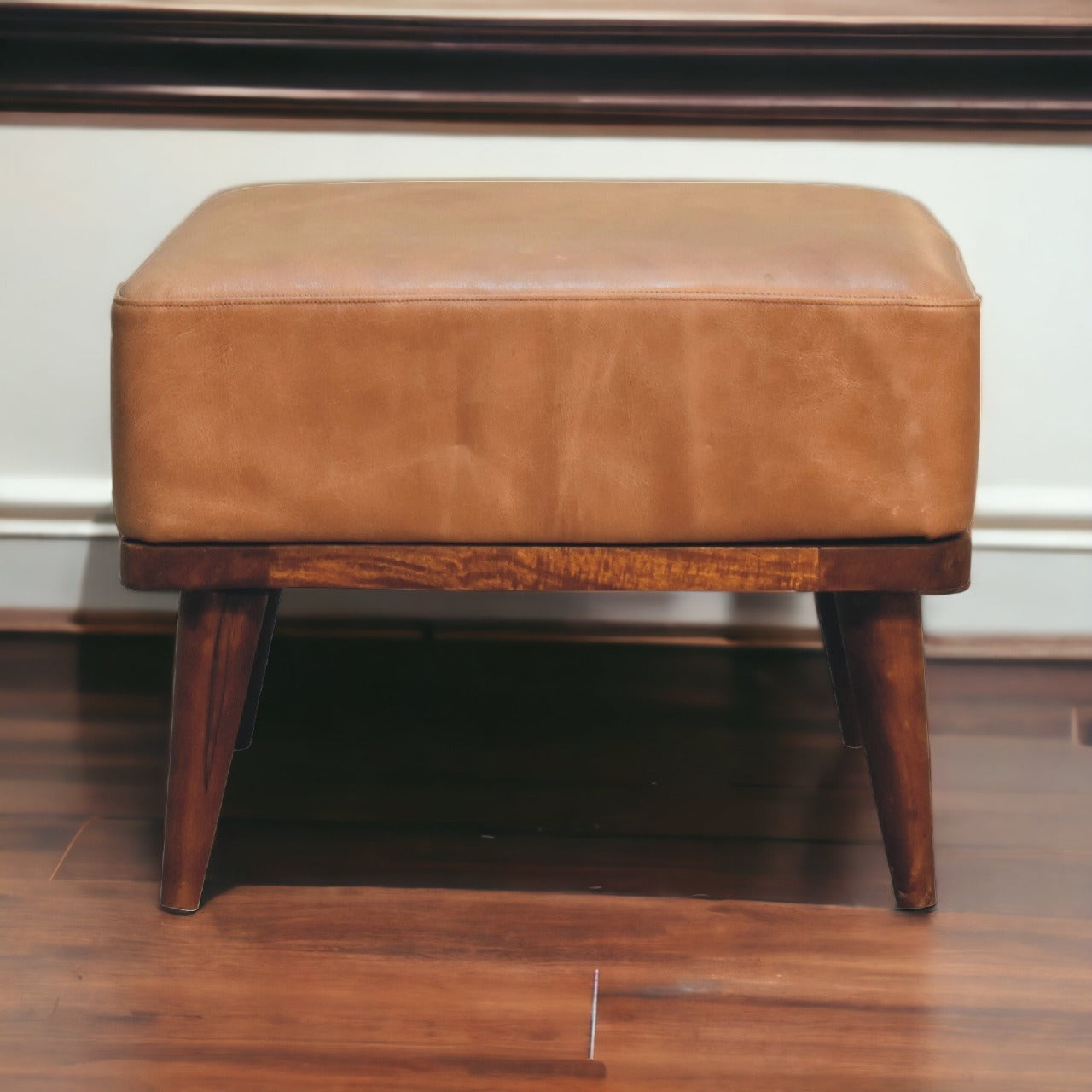 Image of artisan-made footstools crafted by artisans and shipped from   Canada. Comfortable, stylish, and built with lasting materials.