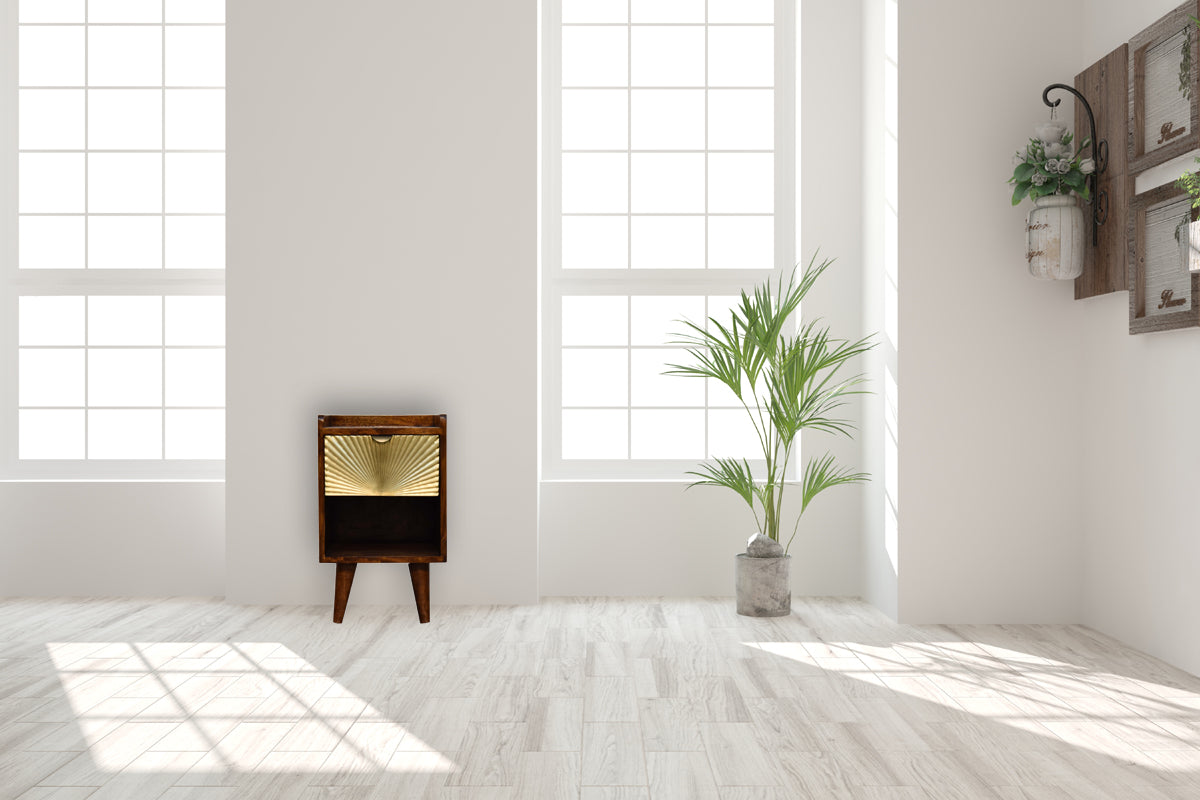 Mini Manila Gold Chestnut Nightstand with brass plated drawer, open storage slot, and Nordic style legs. Nightstand in a living room space.