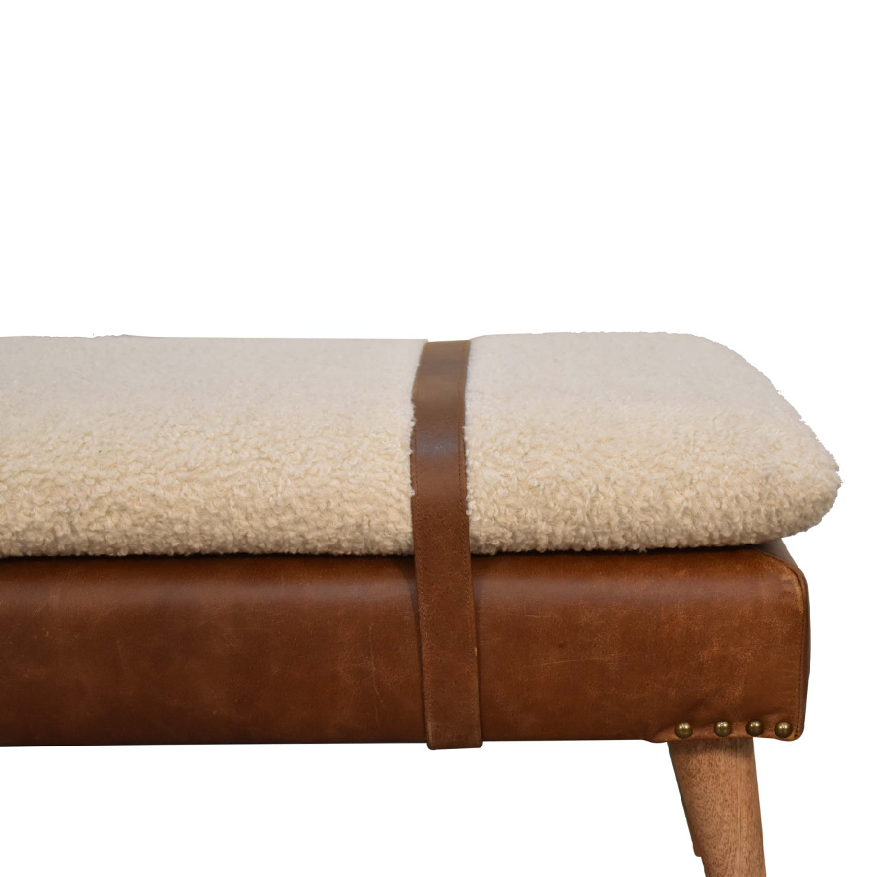 Modern boucle bench with white cushion and buffalo hide leather base – rustic accent seating for living room or entryway.