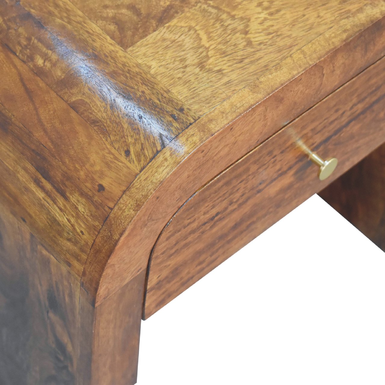 Darcy chestnut nightstand with curved edges and one drawer with brass knob. closeup drawer view