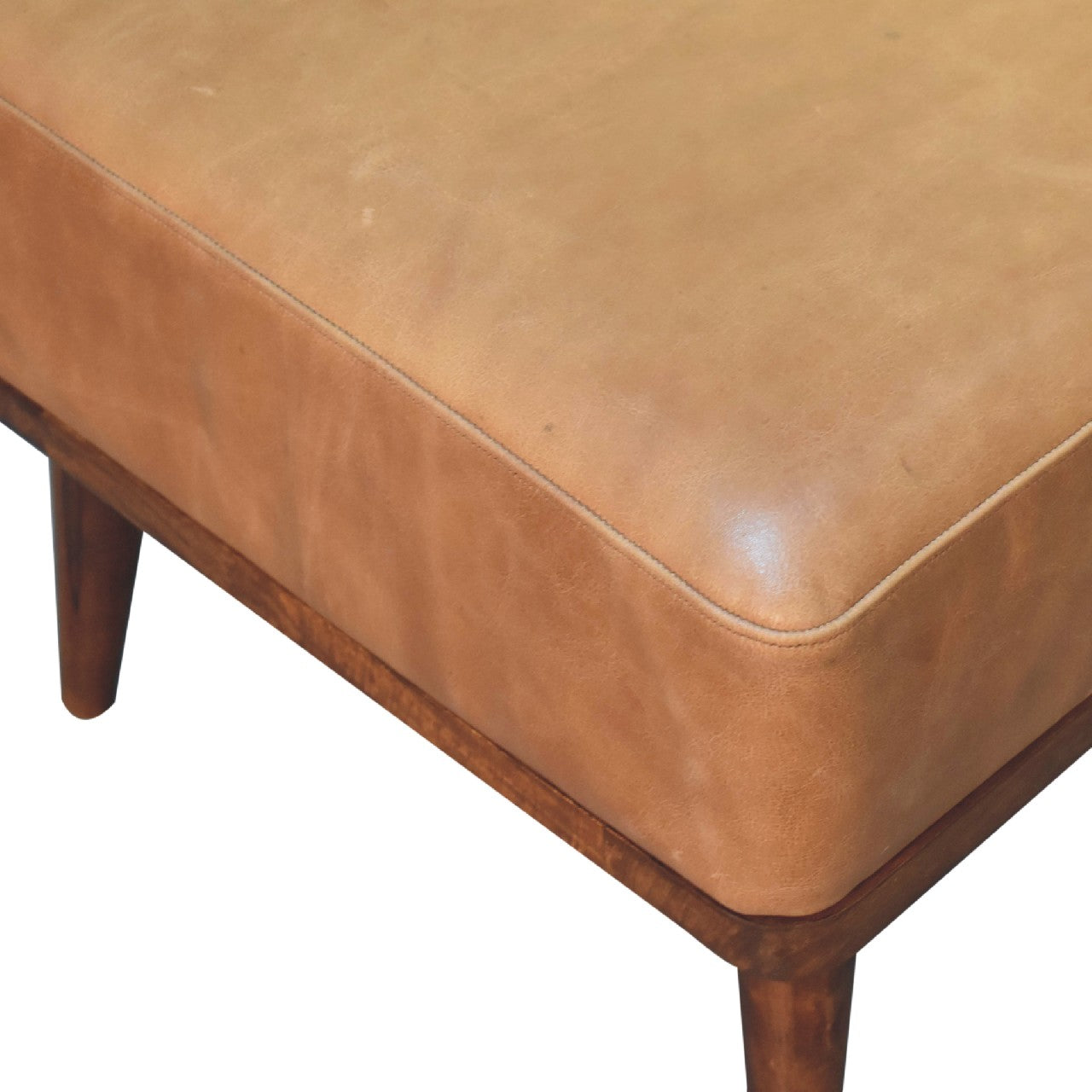 Tan Buffalo Leather Footstool with solid mango wood legs in chestnut finish. Top edge view