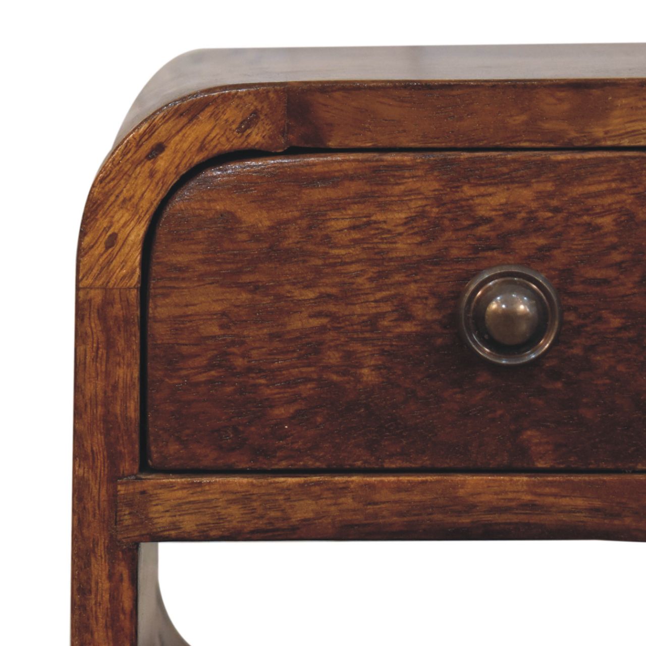 Extra Mini Chestnut Curve Lower Bedside made from solid mango wood with drawer, open storage slot, and curved edges. Knob view