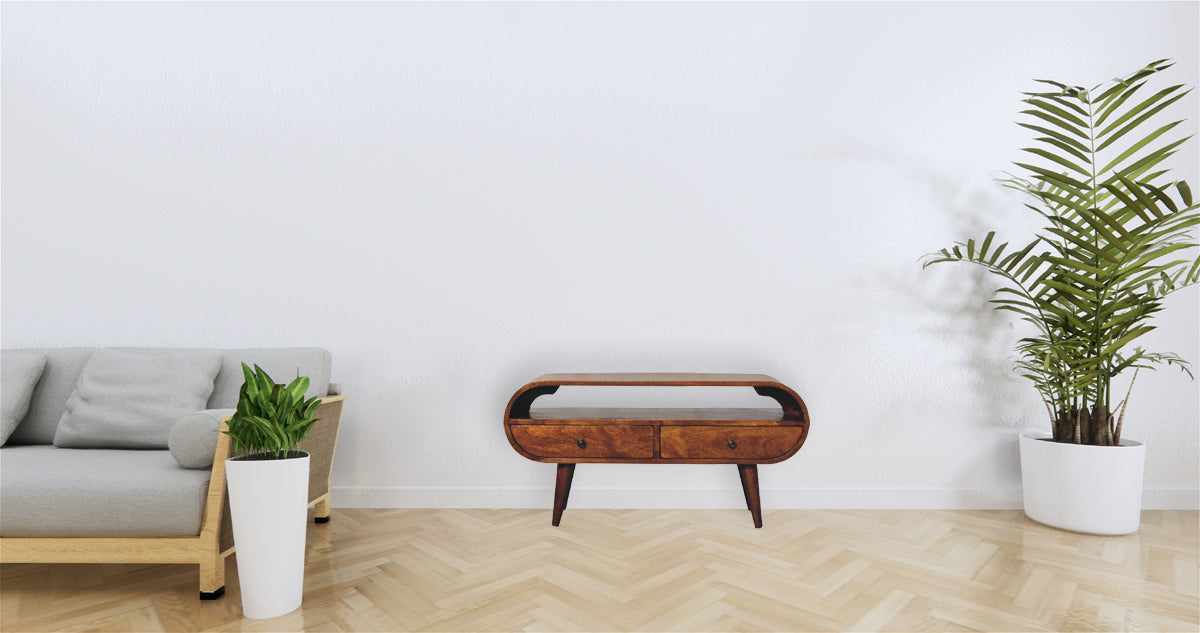 Chestnut Circular TV Stand made from solid mango wood with 2 drawers, open slot, and Nordic-style legs. Positioned in a living room space.
