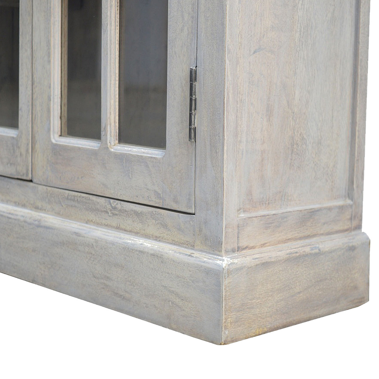 Stone Acid Wash Glazed Sideboard made from solid mango wood with four drawers and four glazed doors. Base view
