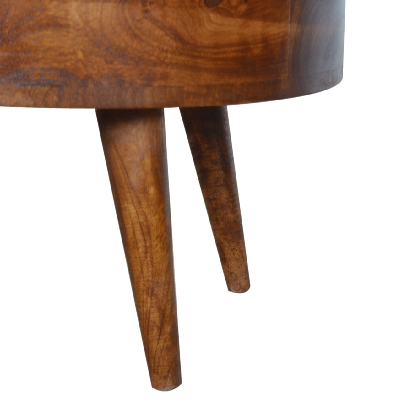 Chestnut Rounded Coffee Table made from solid mango wood with one drawer and Nordic-style legs. Leg view